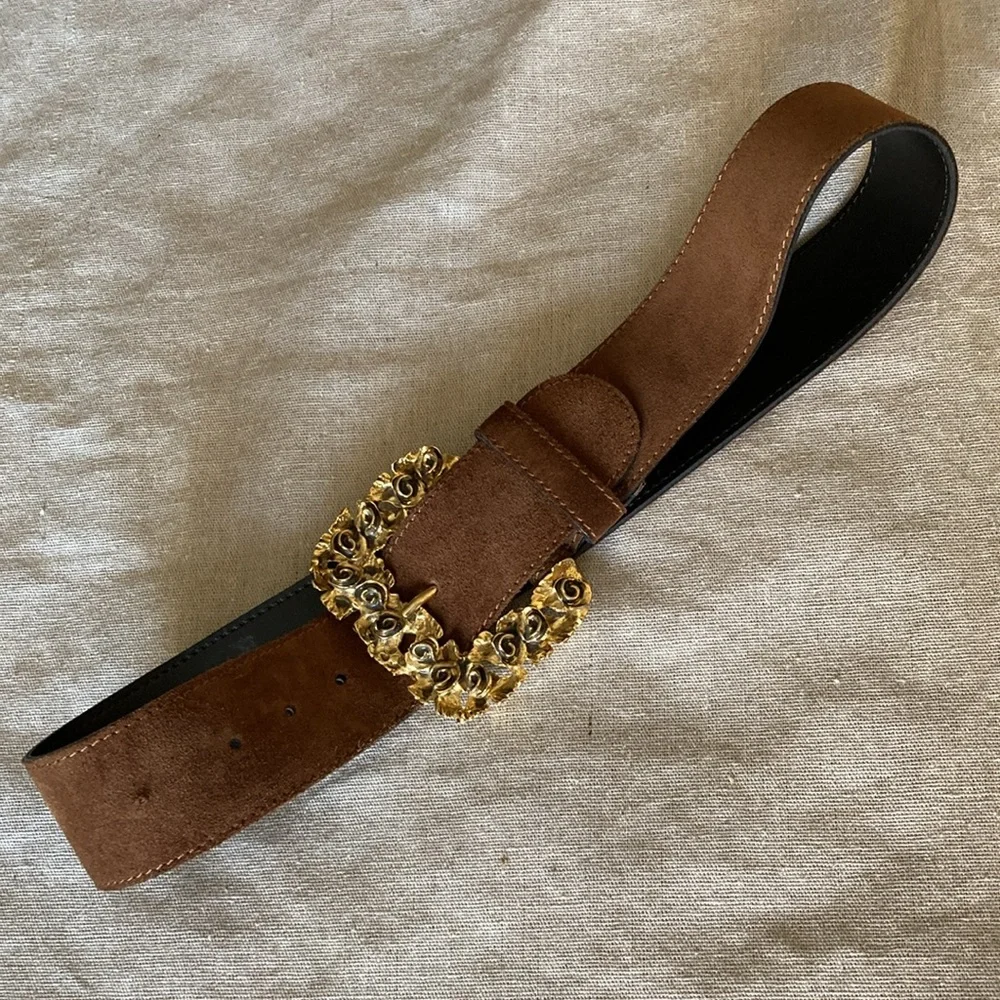 Genuine suede leather belt with one of a kind buckle.
